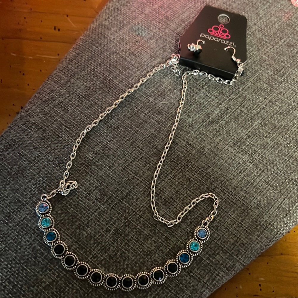 Blue stones fade into darker blue..